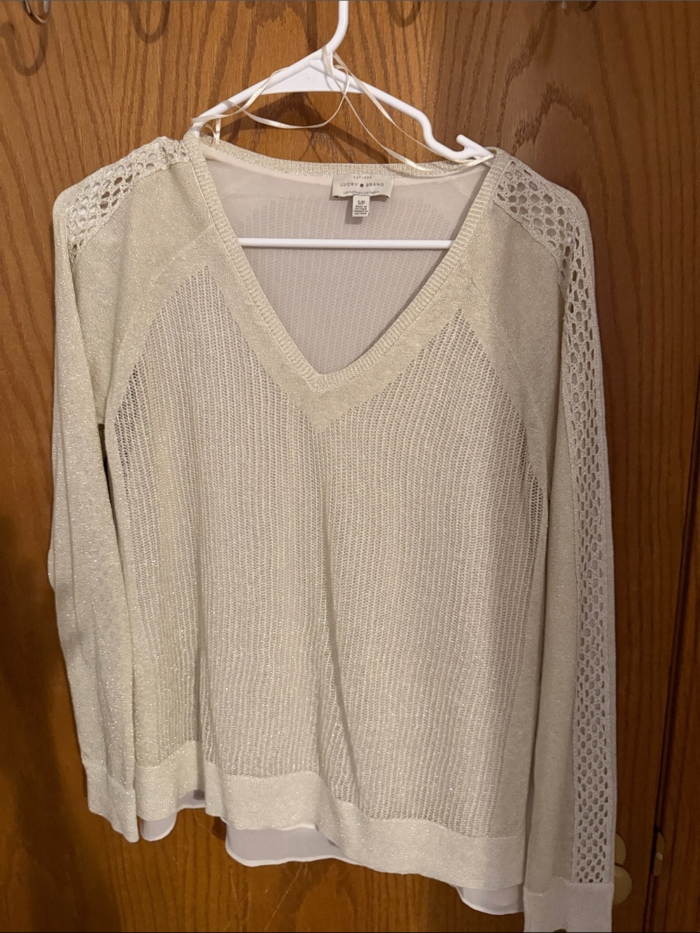 Lucky Brand Ivory V-Neck top
17” across 23” top to bottoms never worn